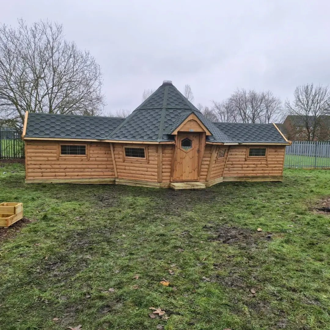cabin with two side extensions for Phoenix academy