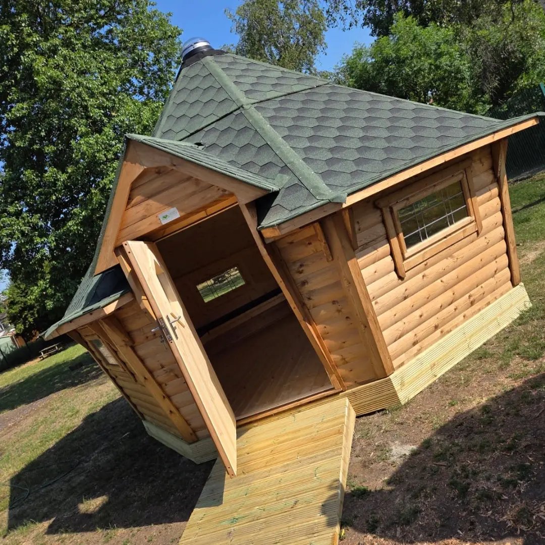 log cabin for newton farm school