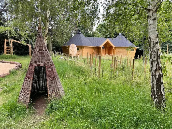 forest school connected log cabins