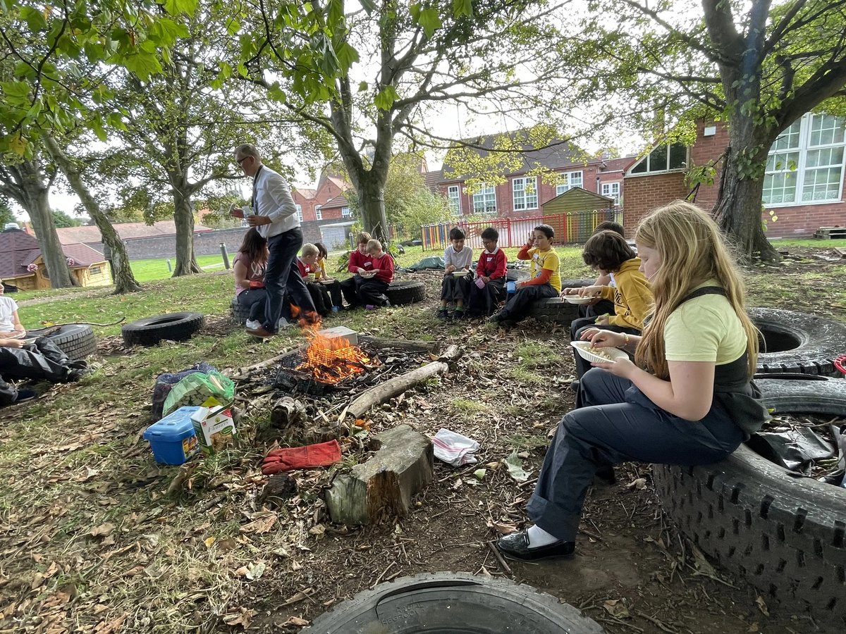 children engaging in outdoor learning 