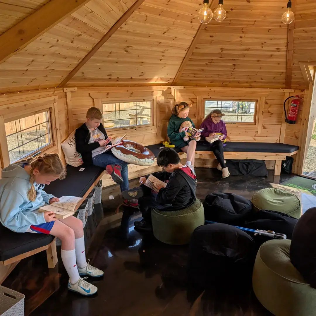 pupils reading in story nook