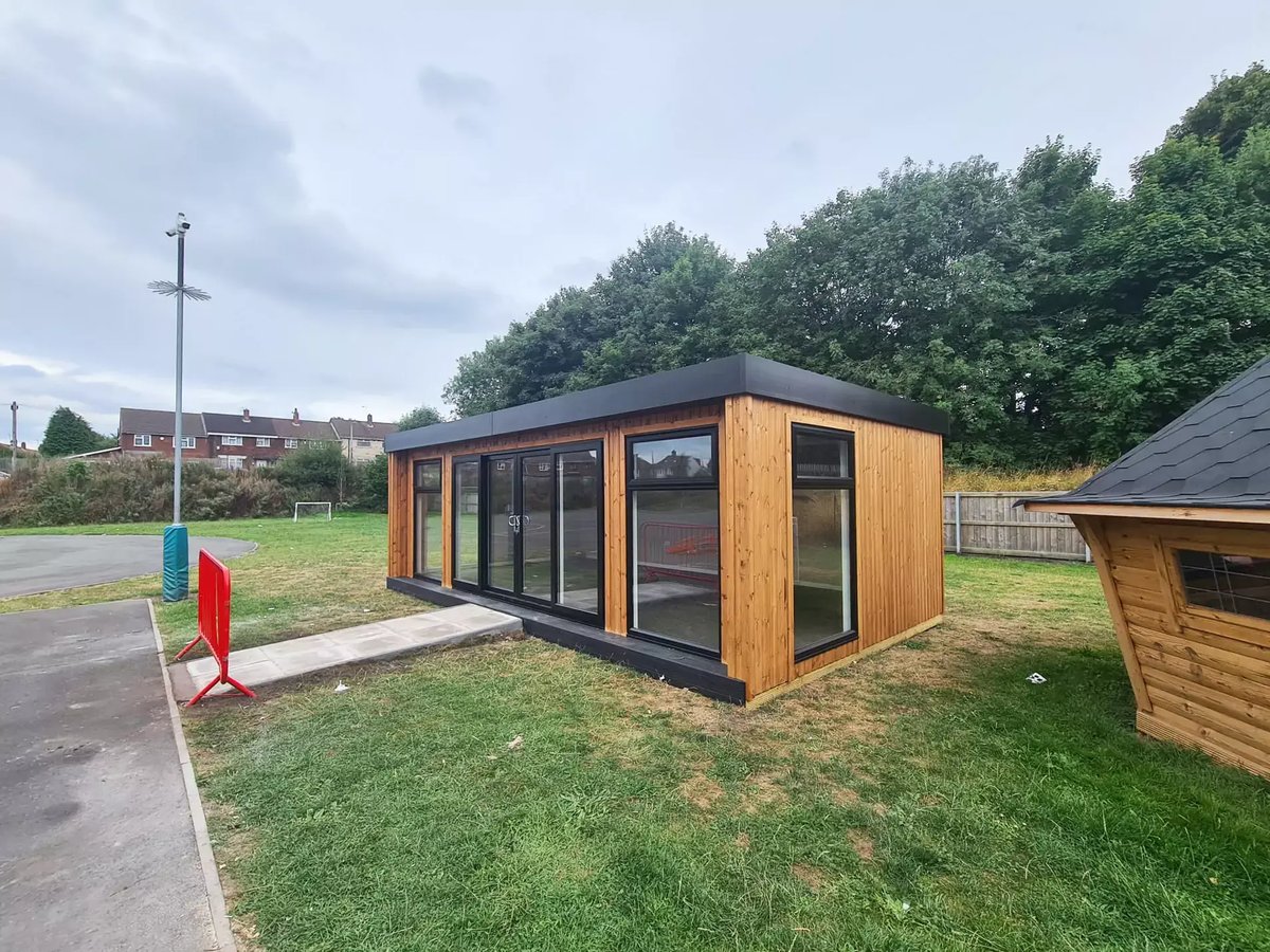 eco school room and log cabin 