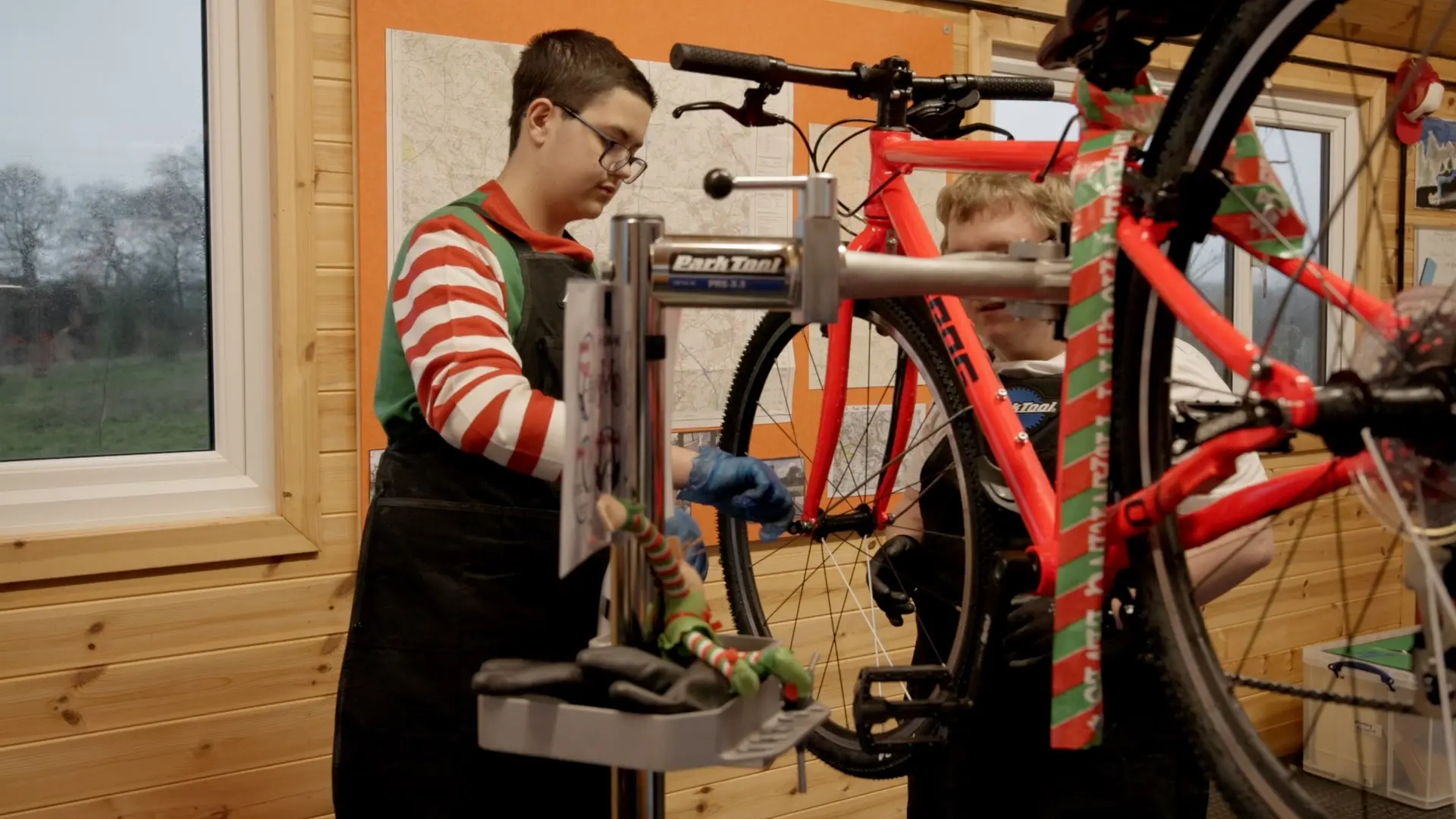 teenager working on bicycle repair life skills