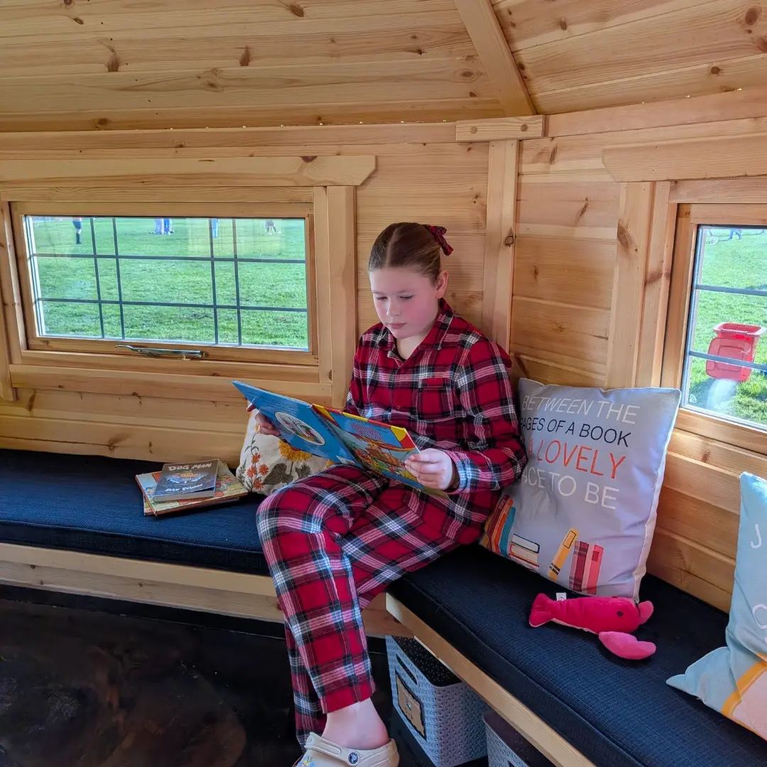 reading for pleasure at school in dedicated library