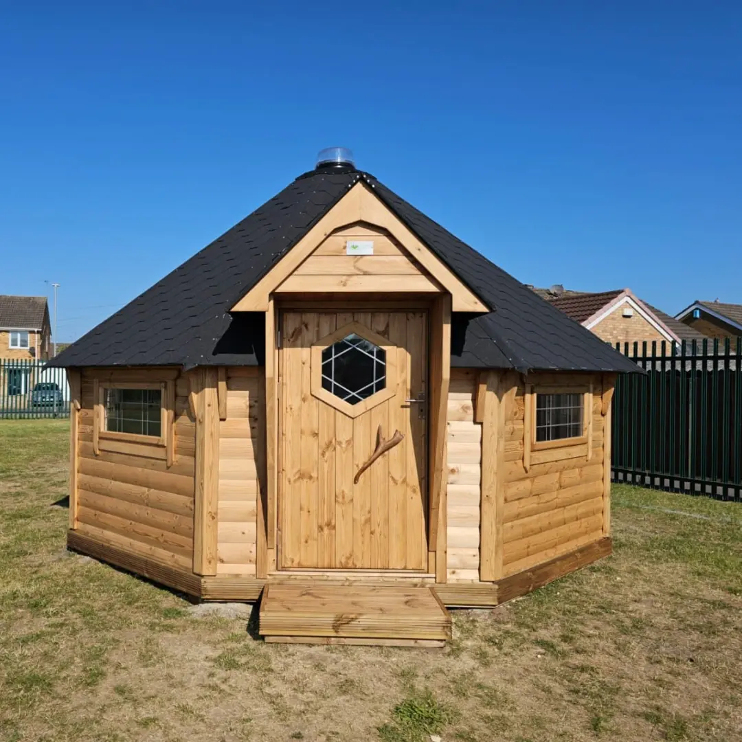 timber school cabin on playground for outdoor learning and small group work